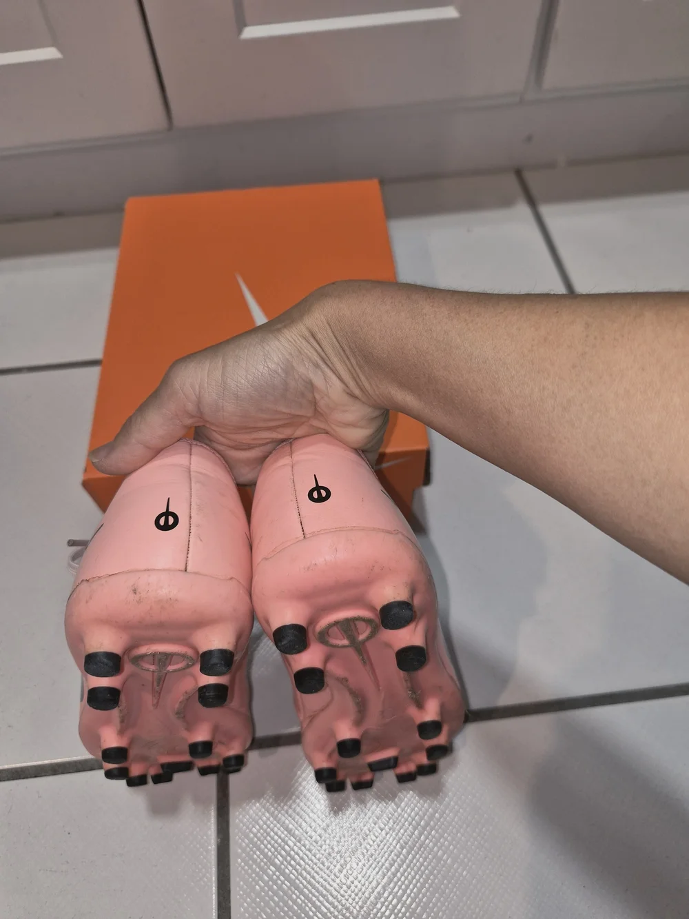 Nike Pink Soccer Cleats with Black Swoosh